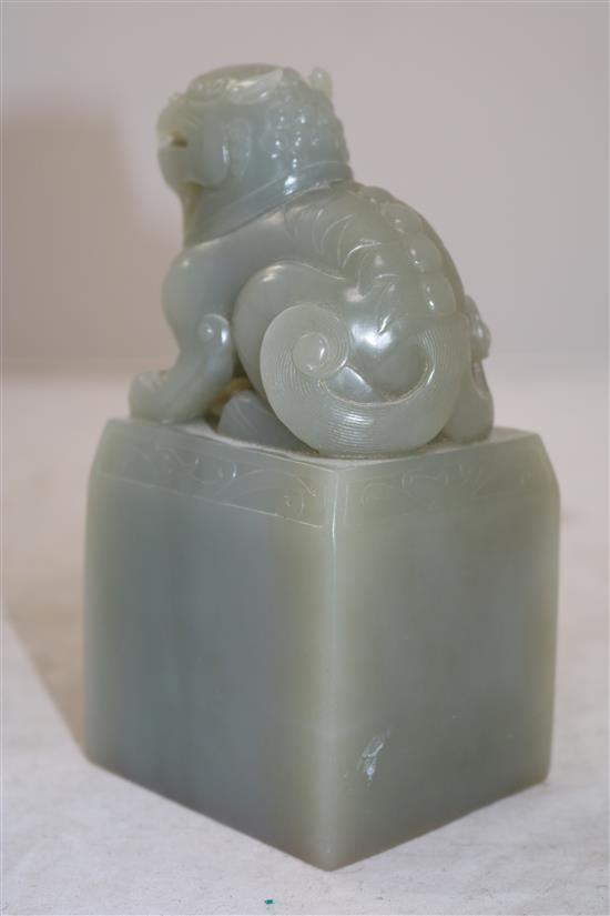 A large Chinese celadon jade lion-dog seal, height 15.5cm